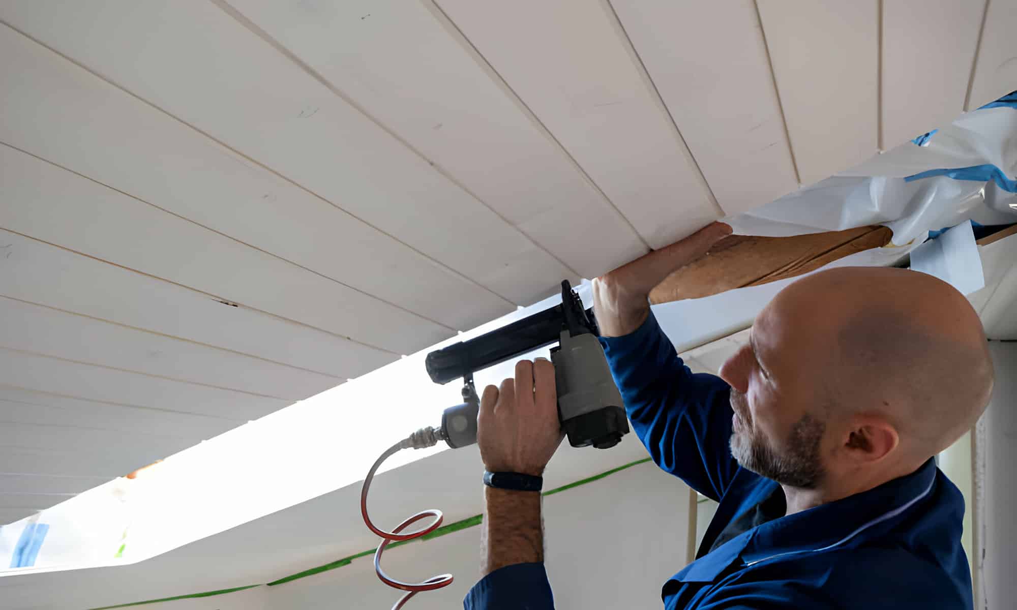 Sealant applied around an attic floor penetration before insulation is added